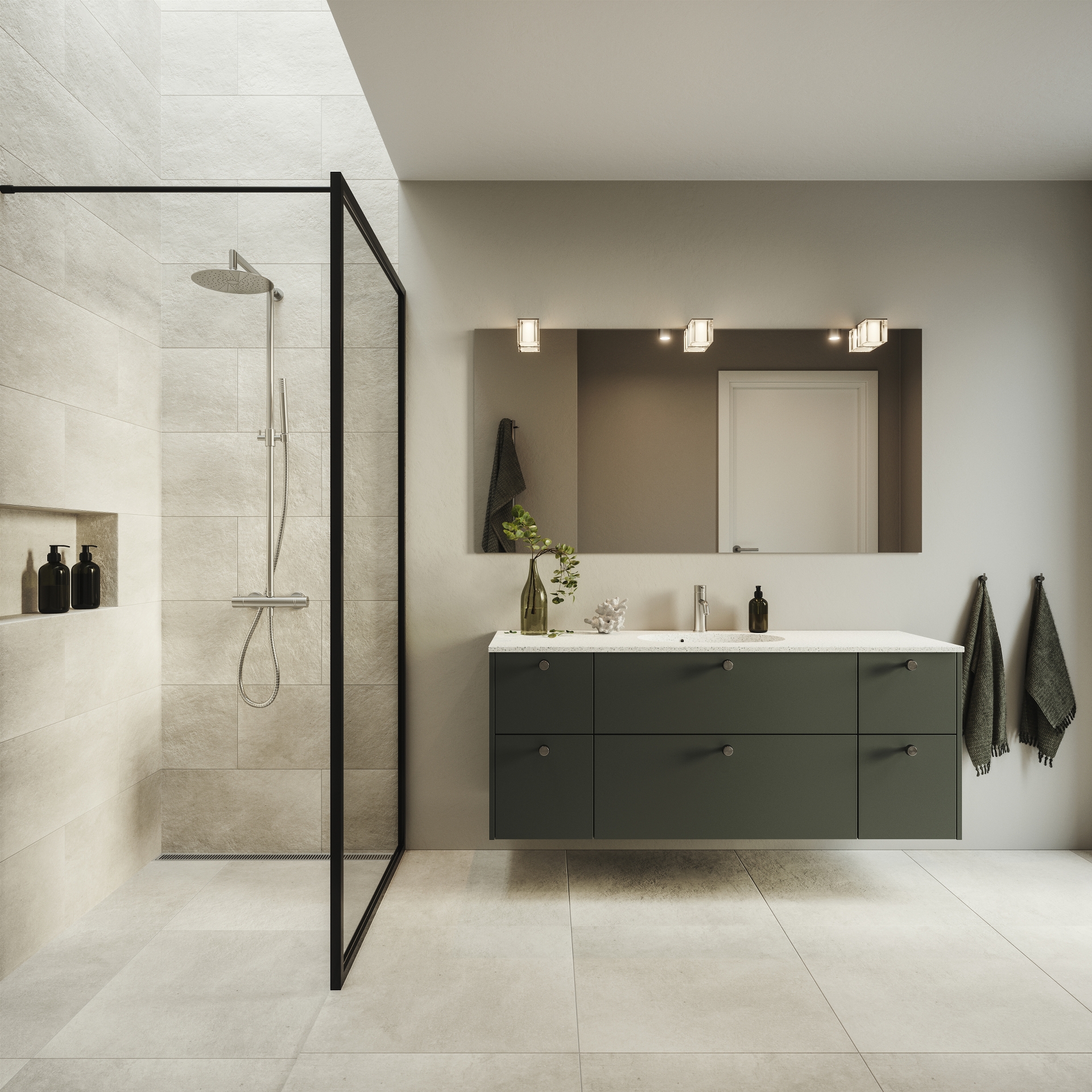 Silk by Designa bad ultramat sort med hvid stone bordplade og Cassøe armatur i børstet stål