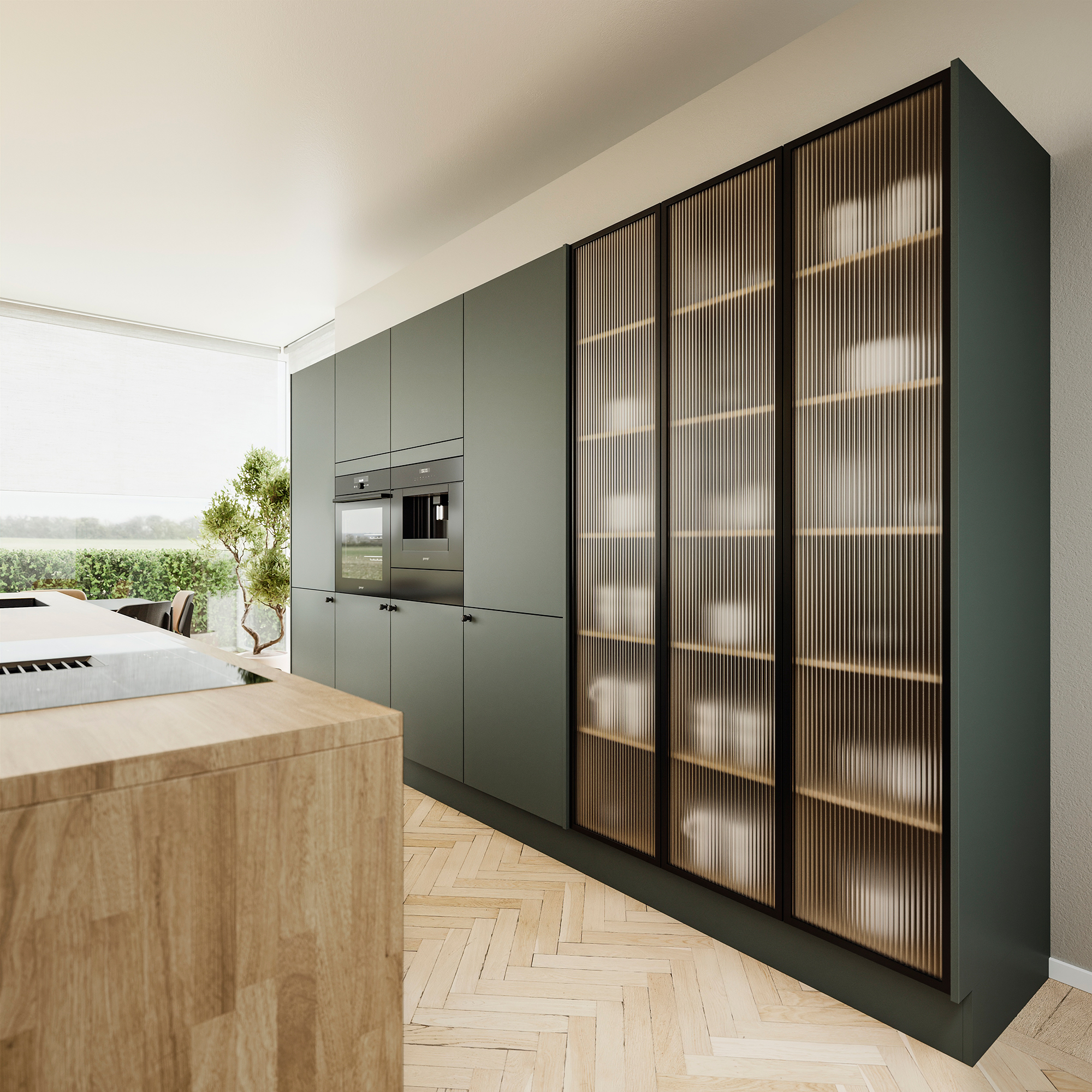 Silk by Designa køkken i grøn med riflet glas i sort alu-ramme